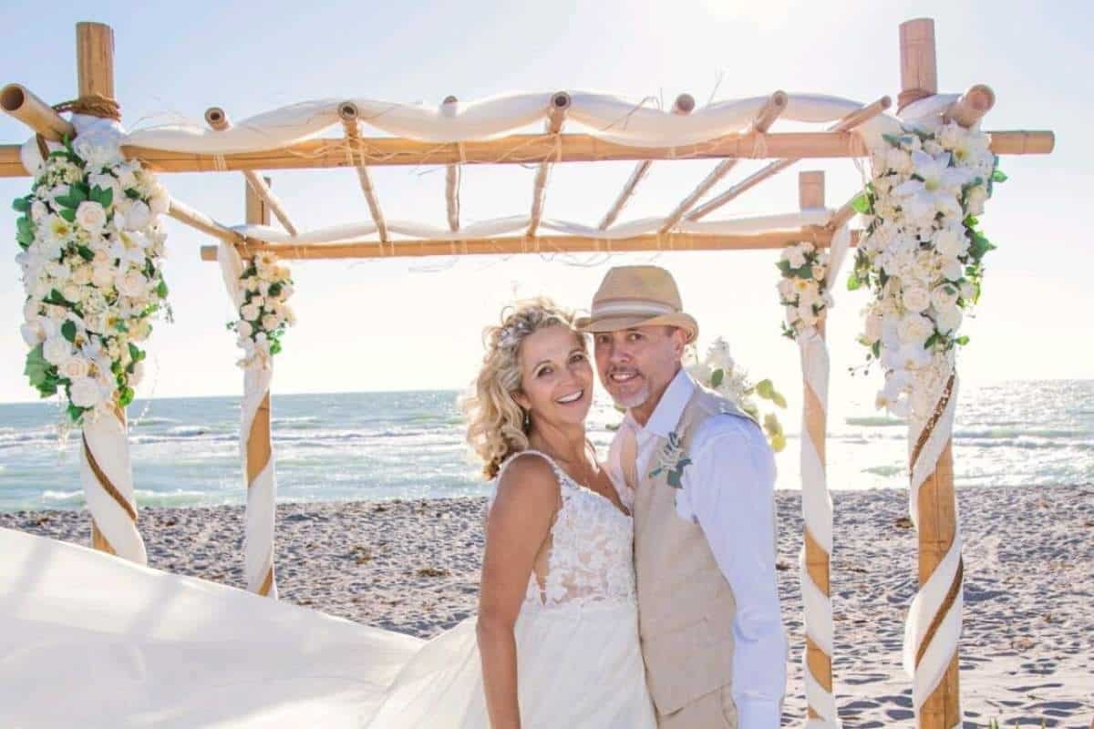 brian and dawn on their wedding day looking happy and in love