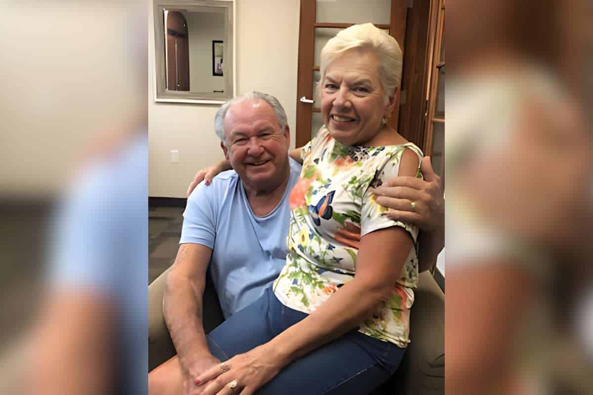 Gary and Sheryl sitting together in our office. They came by so our team could see them happy and in love!