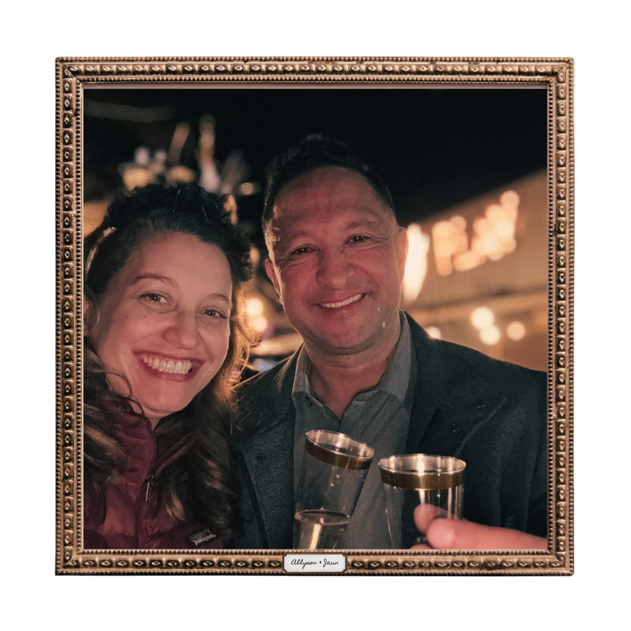 Happy couple clinking cups over wine