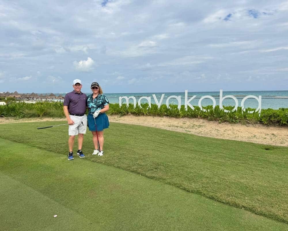 Matchmaking success couple standing together on golf course
